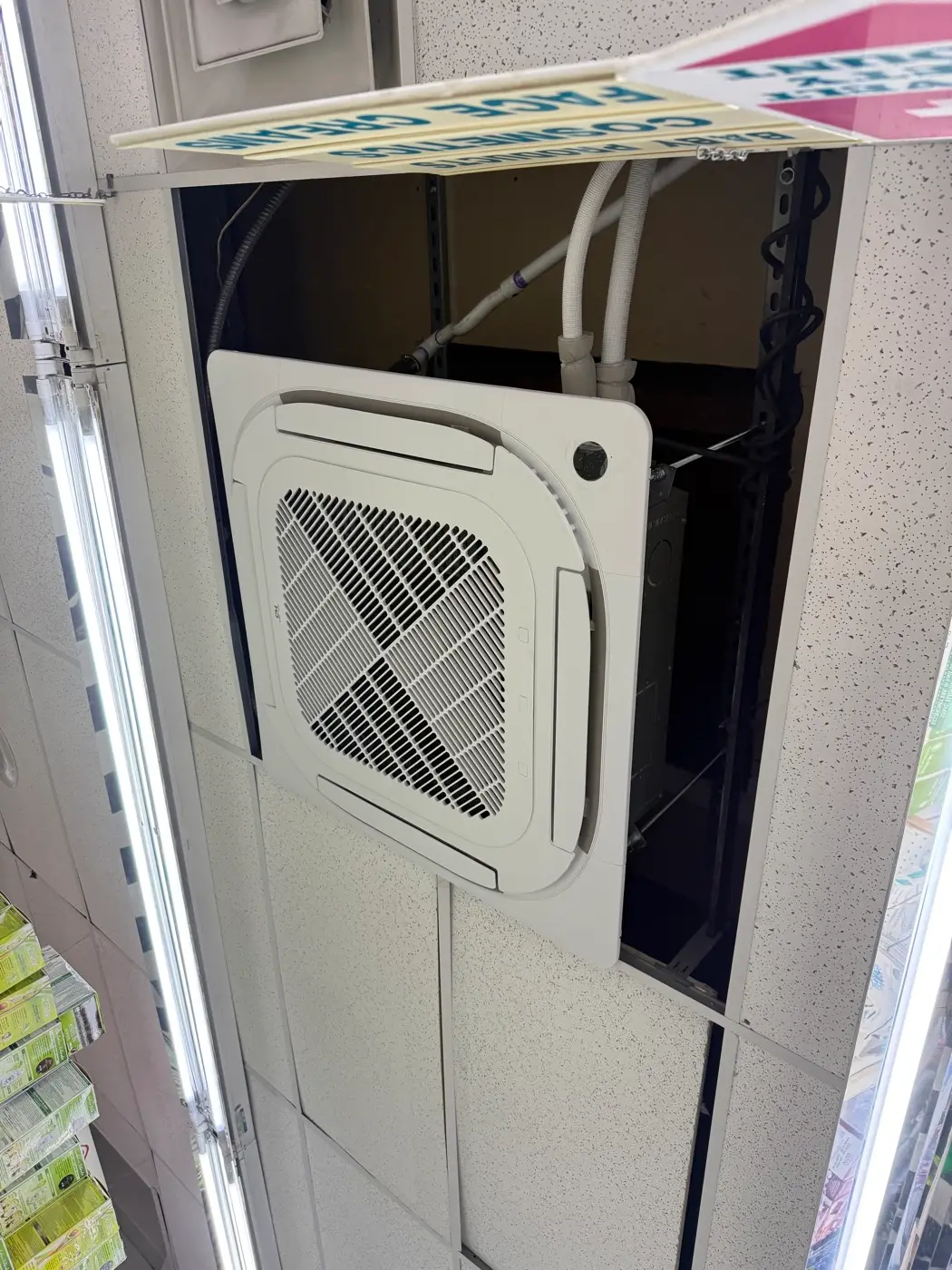 Ceiling-cassette unit installed in a retail store's suspended ceiling